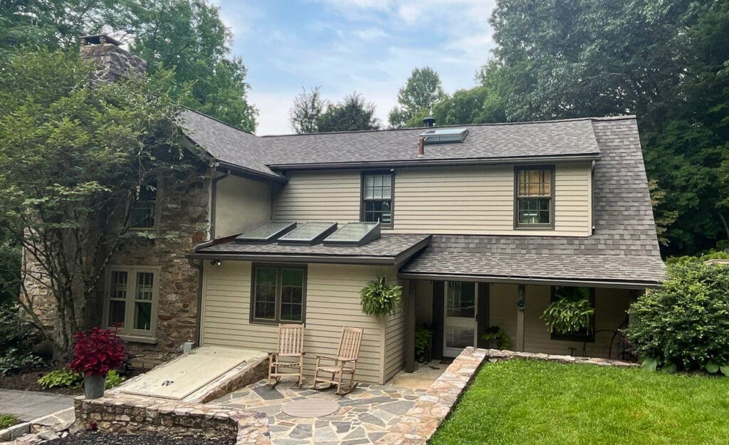 Customer’s residential house with new roofing and sidings