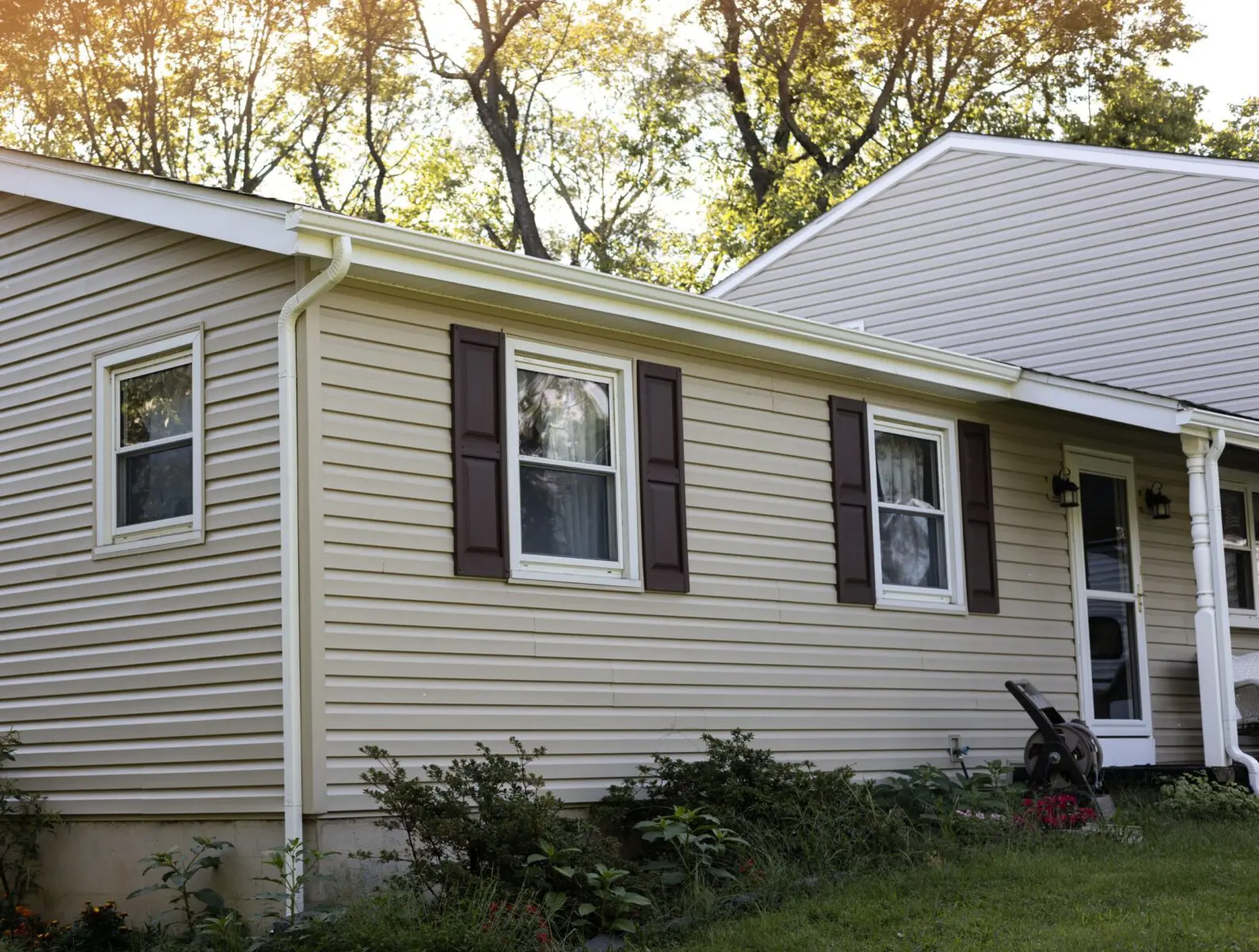 House exterior with newly installed siding panels.