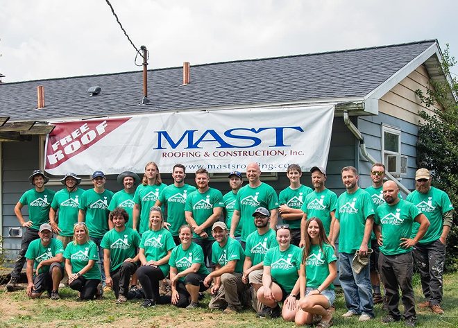 Team photo of mast roofing and construction