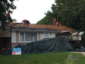 Residential Roofing Contractors Repairing a Roof