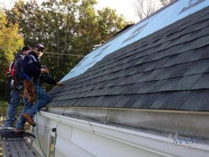 Roofers Completing a Roof Installation